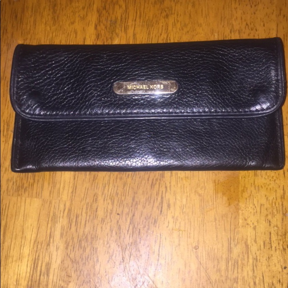 SOLD Authentic Michael Kors black leather wallet!